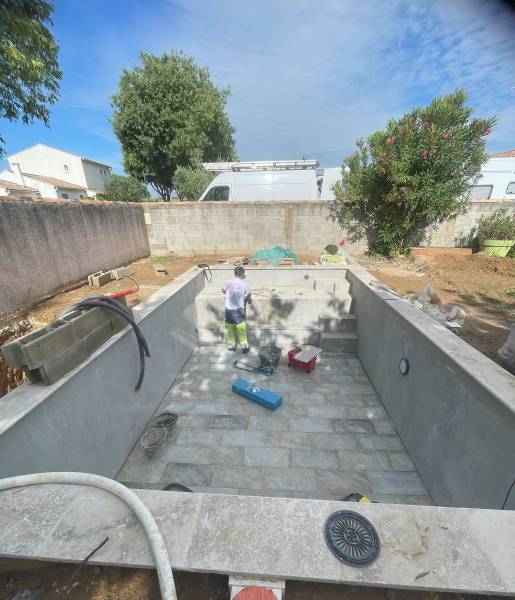 Projet de construction de piscine en agglo à bancher dans le secteur Vaunage 30