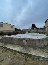 Constructeur de villa moderne,   construction et réalisation de la dalle du RDC Milhaud, proche de Nimes dans le 30.